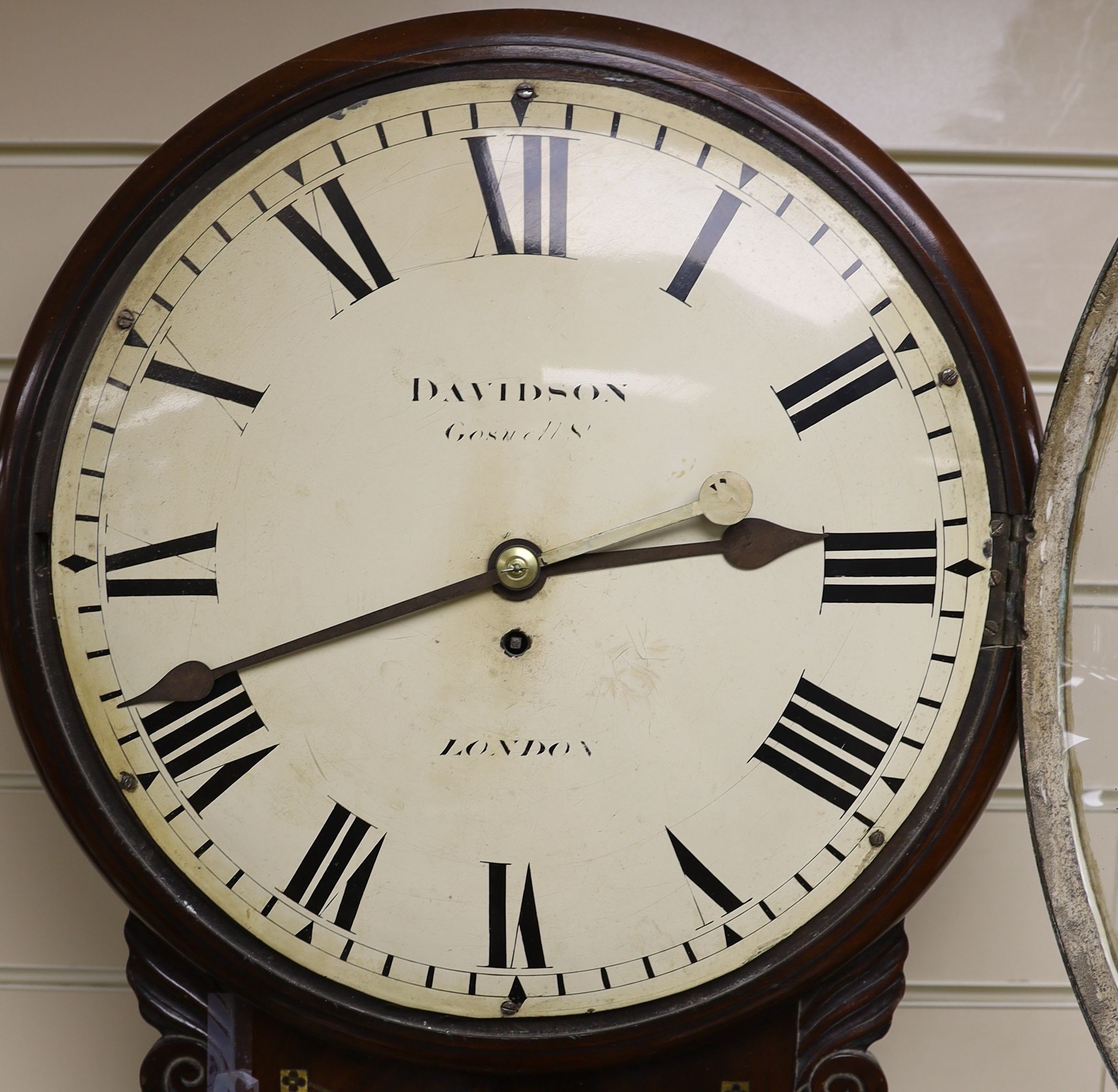 Davidson of London. A William IV brass inset mahogany drop dial wall timepiece